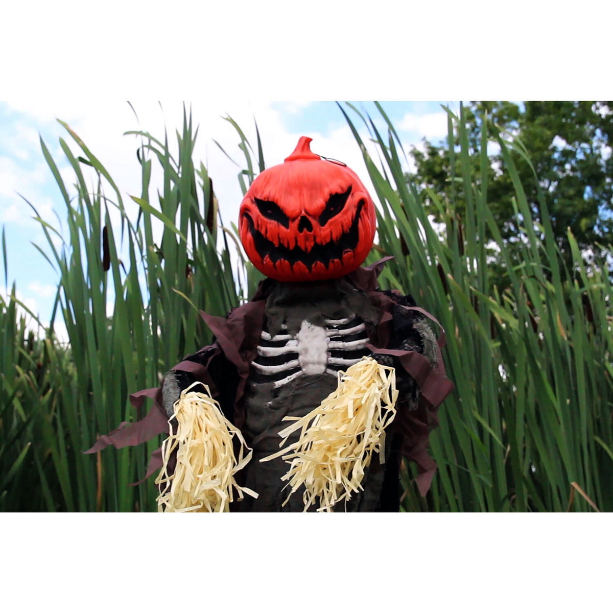 Haunted Hill Farm Life-Size Poseable 6.7-Ft. Pumpkin Scarecrow with Lights and Sound, Indoor or Covered Outdoor Halloween Decoration